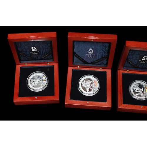 822 - Four Official Commemorative Silver Coins for the Games of the XXIX Olympiad, each Proof Struck, 40mm... 