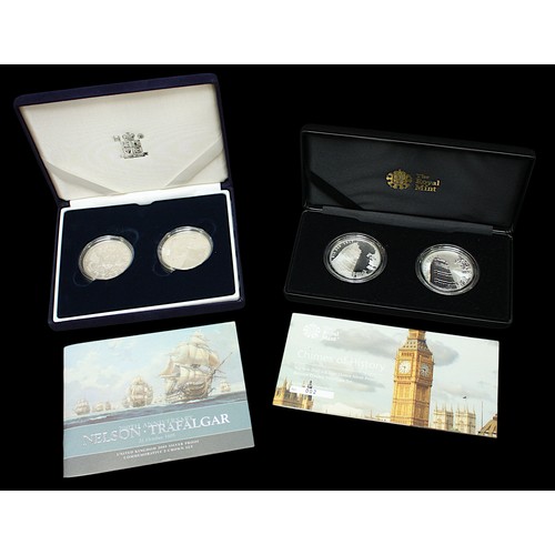 818 - Two Royal Mint cased silver two-coin sets, comprising ‘Chimes of History’ and ‘200th Anniversary Nel... 