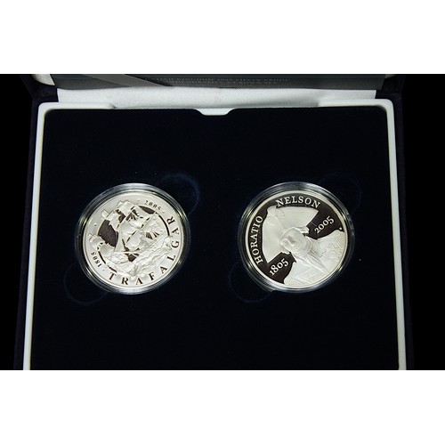 818 - Two Royal Mint cased silver two-coin sets, comprising ‘Chimes of History’ and ‘200th Anniversary Nel... 