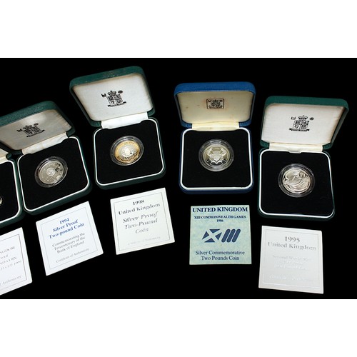 821 - A collection of ten assorted Royal Mint silver proof £2 coins, all with clear plastic capsules, larg... 