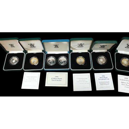 821 - A collection of ten assorted Royal Mint silver proof £2 coins, all with clear plastic capsules, larg... 