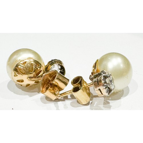 93 - A pair of 18ct yellow gold cultured pearl earrings, pearls approximately 10mm each, to the top of pe... 