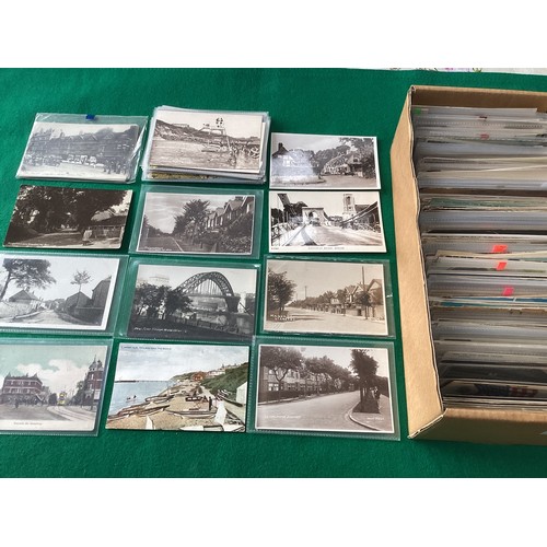 578 - A box of mainly British topographical cards with some real photographic street scenes. The lot compr... 