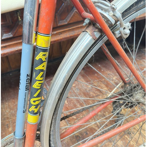 252 - A Team Raleigh ‘Europa’ race road bicycle, red frame, with Raleigh 610 Weinmann brakes, Velo saddle,... 