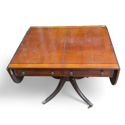 146 - A 19th century mahogany sofa table, the crossbanded top with drop ends, two frieze drawers, with bra... 