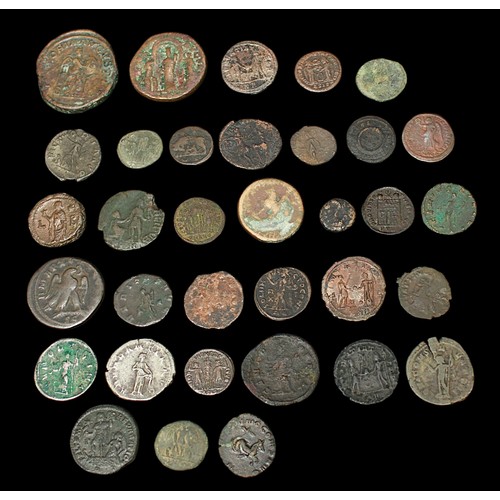 842 - A collection of thirty-two, mostly bronze, Roman coins but including a Trajan Decius silver Antonini... 