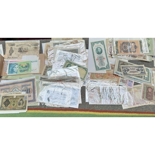 851 - A good quantity of used world banknotes, including an 1882 Stockton-on-Tees Five Pounds (AF with pie... 