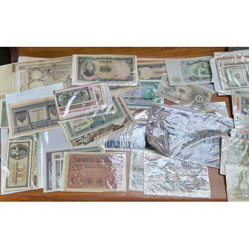 851 - A good quantity of used world banknotes, including an 1882 Stockton-on-Tees Five Pounds (AF with pie... 