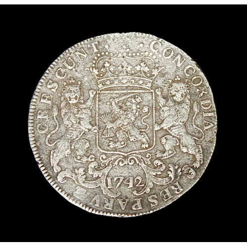 854 - A Dutch silver 'rider' or Ducatoon dated 1742, recovered treasure from the wreck of the Dutch-East I... 