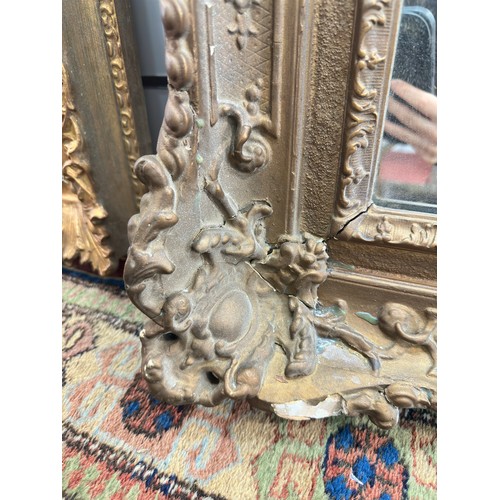 139 - Two large 19th Century rectangular wall mirrors, ornately carved giltwood and gesso moulded frame wi... 