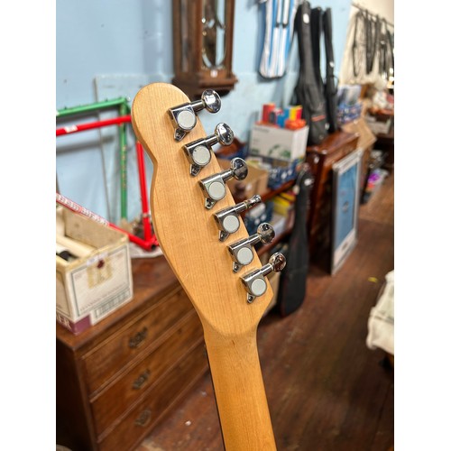 313 - Five various electric guitars in traditional Fender-style body shapes, to include a Fender Squier Af... 