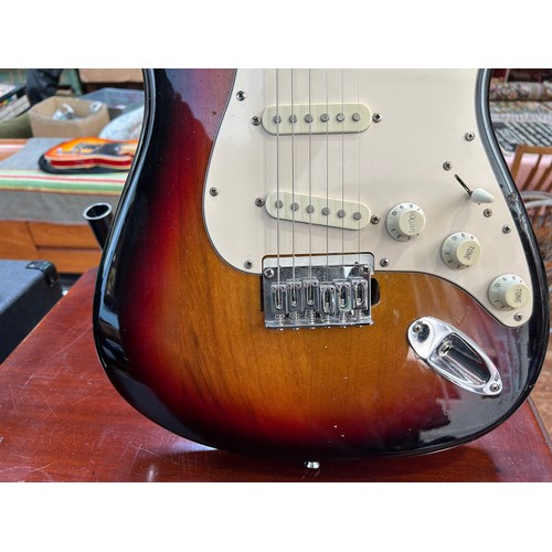 313 - Five various electric guitars in traditional Fender-style body shapes, to include a Fender Squier Af... 