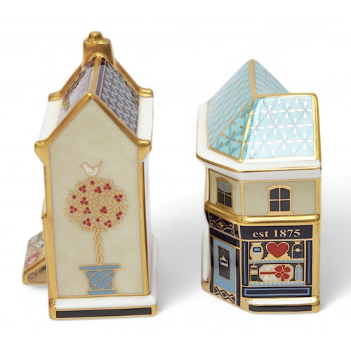 271 - Five assorted Royal Crown Derby paperweights modelled as shops and houses, each with white stopper, ... 