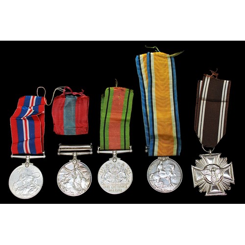 153 - Five various medals, comprising a Royal Marine's Naval General Service medal named to PO.X. 1089 N. ... 