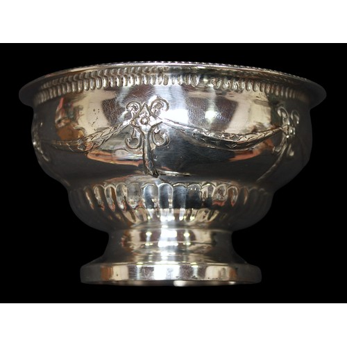 313 - A George III small silver bowl, with beaded rim, relief moulded swags to side and raised on circular... 