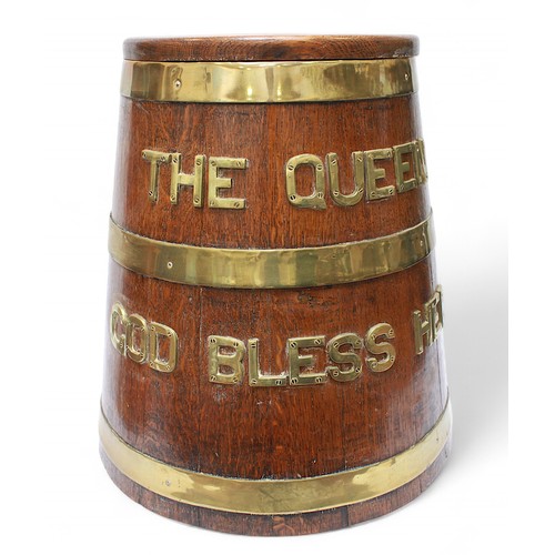 20 - A brass-bound oak Naval 'style' rum barrel mounted with brass letters 'The Queen God Bless Her,' 51 ... 