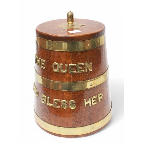 21 - A brass-bound oak Naval 'style' rum barrel mounted with brass letters 'The Queen God Bless Her,'  34... 