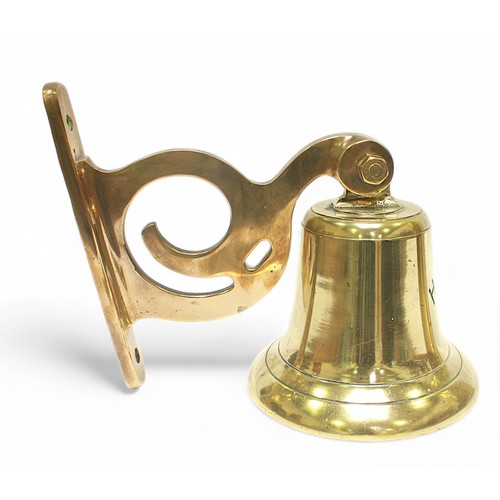 31 - A brass ship's bell cast with the name 'HAWK', on wall bracket, together with a sliding brass chart ... 