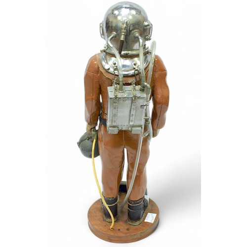 24 - A scratch-built carved and painted wooden and stainless-steel figure of a Deep Sea Diver, presented ... 