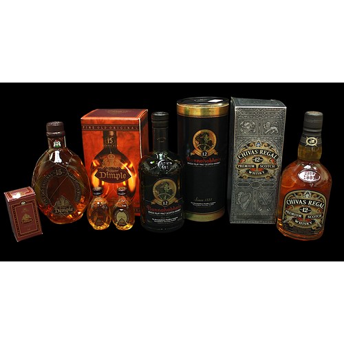 233 - Three boxed bottles of Scotch Whisky, comprising Chivas Regal Premium Scotch, Aged 12 Years, 70cl, 4... 