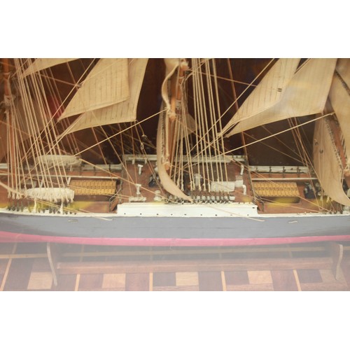 34 - A fully-rigged static painted wooden model of the German Four-Masted Barque Pamir, in full-sail, in ... 