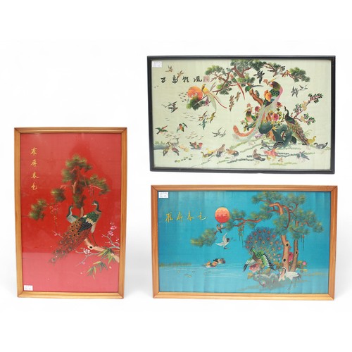 307 - Three various framed Japanese embroidered silk panels, depicting peacocks fantastic birds amidst fol... 