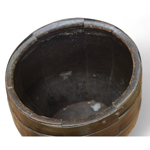 38 - A brass bound coopered spirit barrel, 61cm high.