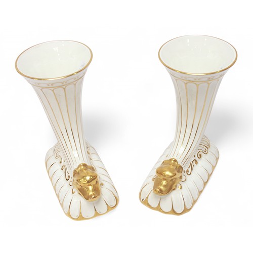 276 - A pair of Coalport cornucopia vases, with gilt scroll and reeded decoration, to a white ground, with... 