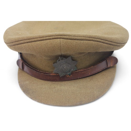 44 - A WWI Hampshire Regiment Officers Home Service Helmet Plate, with black velvet centre having Hampshi... 