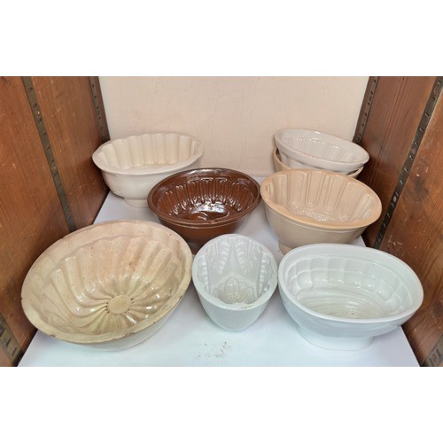 278 - Eight assorted pottery jelly moulds, of various sizes and designs. (SECTION 25)