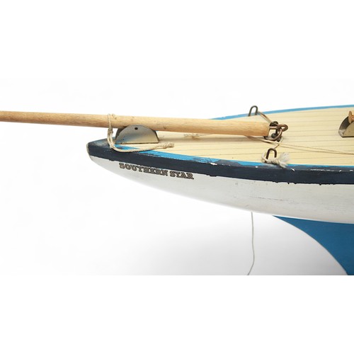 45 - A 'Star Yacht' model pond yacht, solid wooden hull with pen-lined deck and metal keel, without sails... 