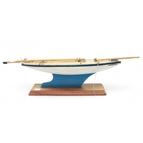 45 - A 'Star Yacht' model pond yacht, solid wooden hull with pen-lined deck and metal keel, without sails... 