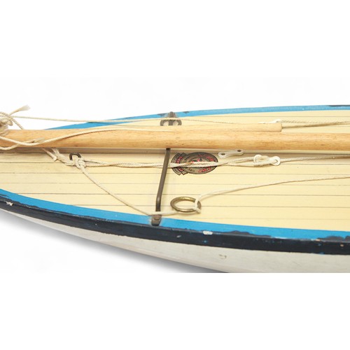 45 - A 'Star Yacht' model pond yacht, solid wooden hull with pen-lined deck and metal keel, without sails... 