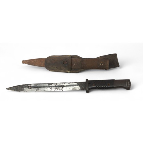 127 - A WWII German K98 Mauser Bayonet with scabbard and leather hanger, pitted 10-inch blade, rusted scab... 