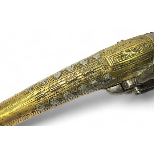 131 - A 19th century Balkan Miquelet flintlock pistol, the stock and butt clad with engraved brass and pew... 