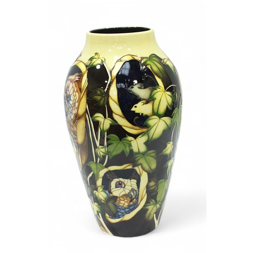 299 - A large limited edition Moorcroft Pottery vase, of ovoid form, in the ‘Hoots at Home’ pattern, desig... 