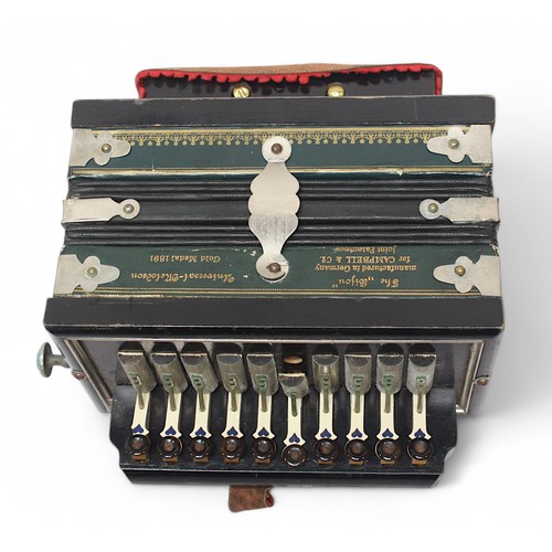 543 - A Universal-Melodeon small squeeze-box, 'The Bijou,' with original hard carry-case, together with a ... 