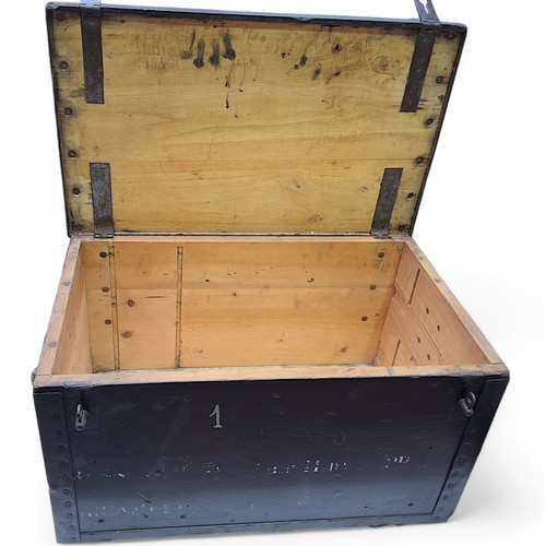 73 - A metal-bound painted wooden trunk, with lockable hasp-and-staples and rope side handles, painted to... 