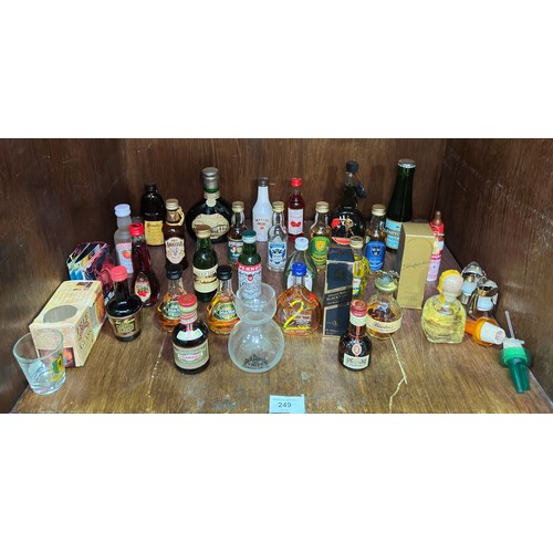 249 - A small collection of twenty-eight bottles of alcohol miniatures, various sizes and fill levels, com... 