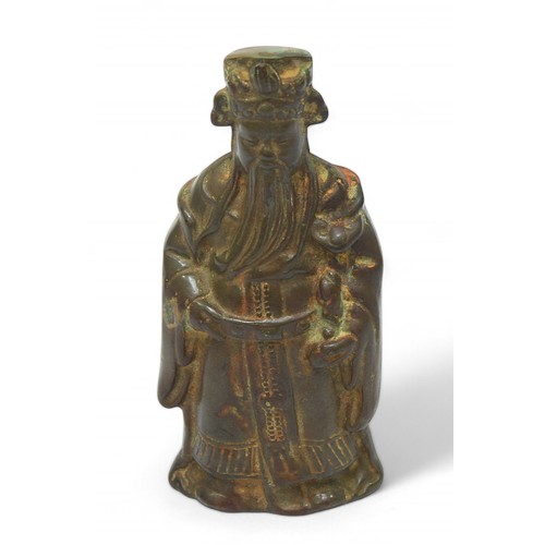 308 - An antique cast metal/cast iron figure of Lu Xing, God of Prosperity, with patination, 16cm tall.