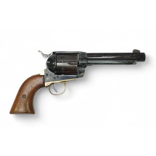 142 - A H. Schmidt .22 Calibre blank firing revolver, with blakened steel chassis and magazine, brass trig... 