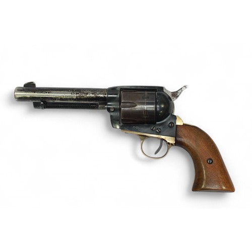 142 - A H. Schmidt .22 Calibre blank firing revolver, with blakened steel chassis and magazine, brass trig... 