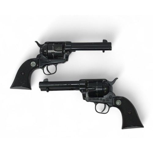 141 - A pair of .22 '.45' style revolvers, finished in black (Made in Italy), with holsters and leather be... 