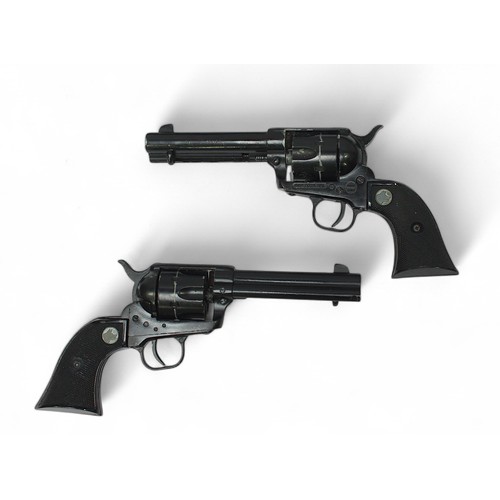 141 - A pair of .22 '.45' style revolvers, finished in black (Made in Italy), with holsters and leather be... 