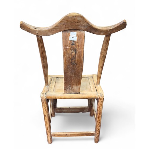 768 - A 19th Century Chinese elm scholar’s yoke back chair, printed character marks to back, 52cm.