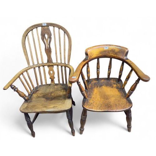 769 - A 19th century yew-wood Windsor chair, of typical form, with pierced back-splat and spindles, raised... 