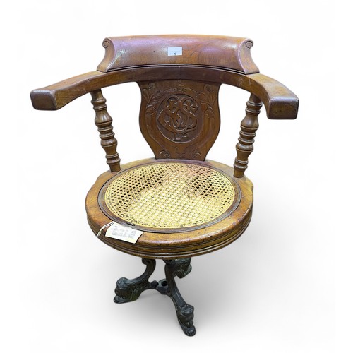 5 - An late 19th/early 20th Century captains chair, the back carved with Union Steamship Company monogra... 