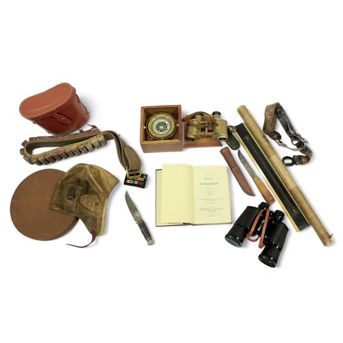 89 - A collection of assorted militaria and ephemera, comprising a leather flying helmet, daggers, binocu... 