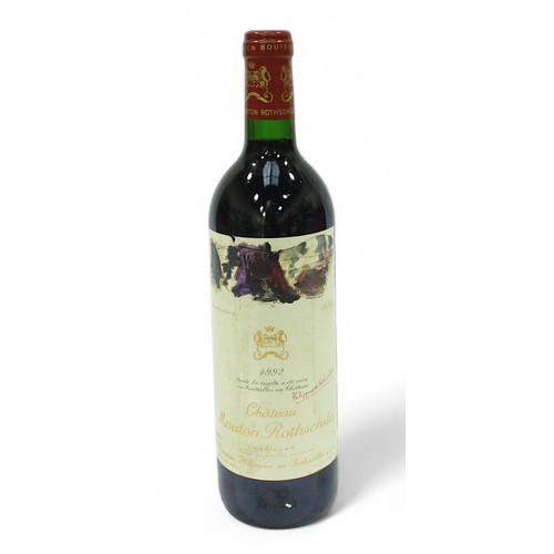 251 - A 75cl bottle of Chateau Mouton-Rothschild, 1992 Pauillac, 12.5%, labels intact, level into neck.