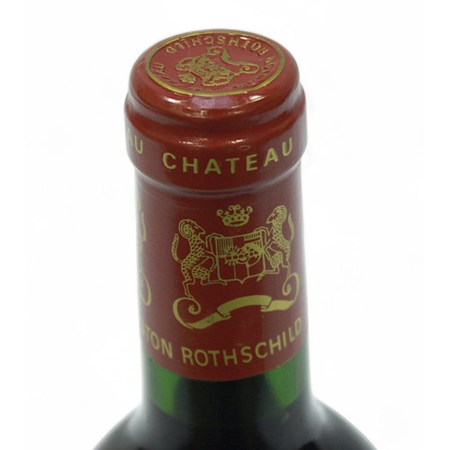 251 - A 75cl bottle of Chateau Mouton-Rothschild, 1992 Pauillac, 12.5%, labels intact, level into neck.